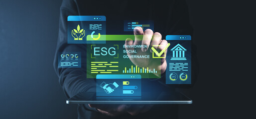 ESG concept with holographic elements for environmental, social, and governance strategies on a...