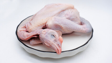 Raw carcass chicken, ayam kampung in Indonesia isolated on white