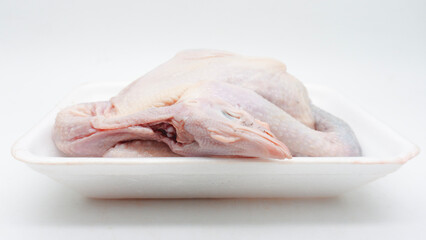 Raw carcass chicken, ayam kampung in Indonesia isolated on white