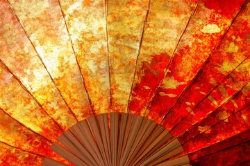Vibrant Red and Gold Umbrella with Abstract Artistic Patterns