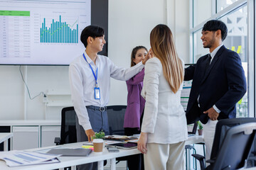 Fototapeta premium Asian Team work, presentation and meeting with office desk, collaboration and laptop or brainstorming for online project. Employee, working together research on tech for info, coworking and company.