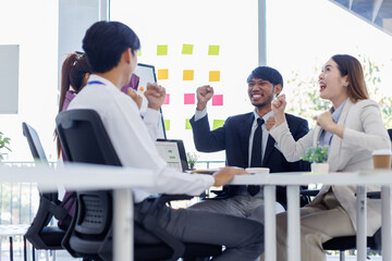 Asian Team work, presentation and meeting with office desk, collaboration and laptop or brainstorming for online project. Employee, working together research on tech for info, coworking and company.