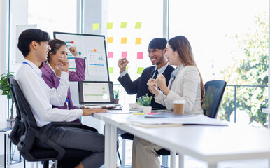 Asian Team work, presentation and meeting with office desk, collaboration and laptop or brainstorming for online project. Employee, working together research on tech for info, coworking and company.