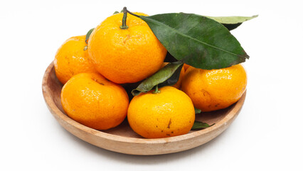 Tangerines. Close view on Fresh Mandarin Orange.  Isolated on White Background. Citrus. Sweet. Juicy. Chinese. New Year. Jeruk Keprok