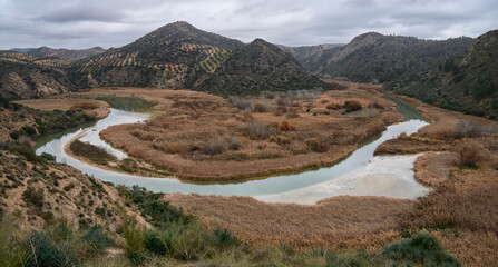 Meander of the Genil River in the Malpasillo reservoir in Badolatosa, Seville. Spain