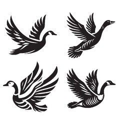 Obraz premium 4 SET OF BLACK High-Quality Vector Silhouette of a Flying Hawaiian Goose on White Background