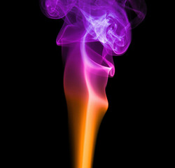Obraz premium Wisps of colorful smoke in shades of purple and orange intertwining on a dark background, creating a surreal and ethereal effect
