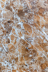 Natural brown marble texture with white veins for interior design and architecture