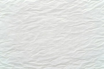 Obraz premium White crumpled fabric background texture displays wrinkles and folds for a textured design.