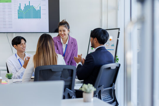 Team Of Asian Business working at the office with documents on desk, planning analyzing the financial report, business plan investment, Consultant, finance analysis concept.