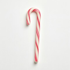 Classic red and white candy cane resting on a neutral background during the holiday season