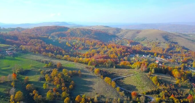Aerial nature autumn landscape flight over picturesque mountains forests meadows