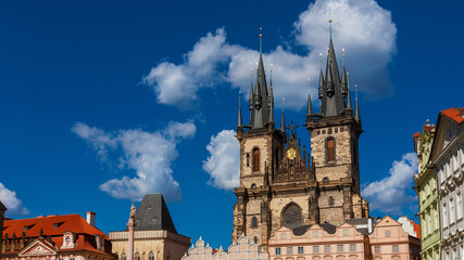 Fototapeta premium Old Town Square in Prague with the iconic Church of Our Lady before Tyn famous gothic twin towers, completed in 1511