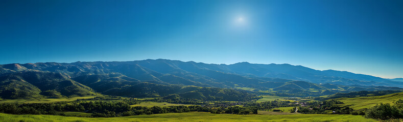Naklejka premium Breathtaking Aerial View of Snow-Capped Mountain Range and Green Valleys