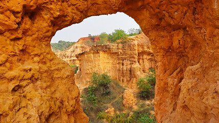 View of the iconic natural gate formation located within the Gangani Grand Canyon, Garhbeta,...