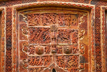 Terracotta depiction of the revolving golden fish targeted by Arjuna during Draupadi's swayamvar at Radha Damodar Temple, Hadal Narayanpur, Bankura, West Bengal, India.