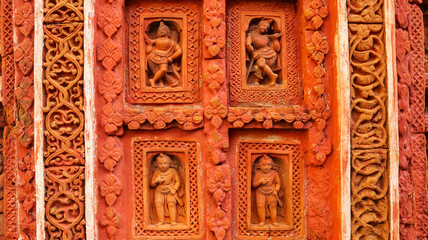 Wide front façade of the uniquely carved Gir Govardhan Temple, Sonamukhi, Bankura, West Bengal, India.