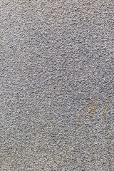 Close-up of textured gray concrete surface showing rough details