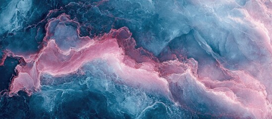Elegant blue and pink marble texture featuring swirling patterns, creating a sophisticated and luxurious background for design projects.