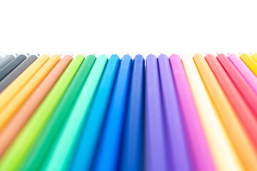 Fototapeta premium Colourful wooden colored pencils isolated on white background with copy space