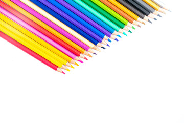 Colourful wooden colored pencils isolated on white background with copy space