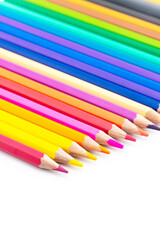 Colourful wooden colored pencils isolated on white background with copy space