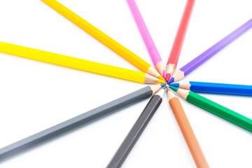 Colourful wooden colored pencils isolated on white background with copy space