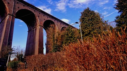old stone bridge viaduct in autumn