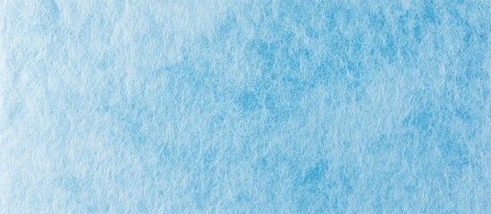 Obraz premium Textured light blue background with soft gradients and subtle blotches, ideal for creating calming or professional designs.