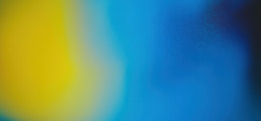 Abstract Gradient: An ethereal and mesmerizing abstract background featuring a vibrant, swirling gradient of yellow and blue, reminiscent of a dreamy sunset or a celestial nebula.