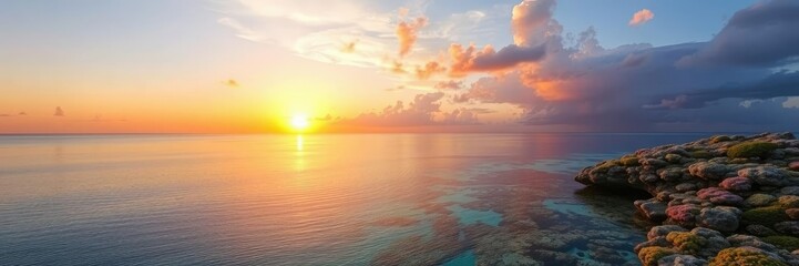Obraz premium Golden hour sunset casting a warm glow over the vibrant coral ecosystem of the Great Barrier Reef in Queensland seascape, marine life, coral reef, underwater