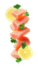 Fresh pieces of salmon with a parsley and lemon. Isolation on a transparent background.