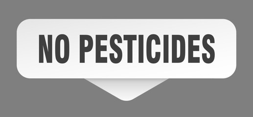 no pesticides sticker. no pesticides sign isolated on gray background