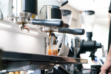 Professional espresso coffee making machine in a restaurant