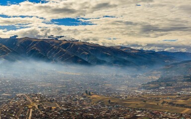 Scenic view of Cusco, Peru with mountains.
