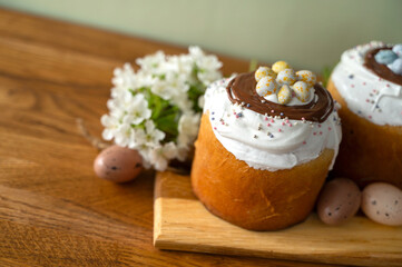 Freshly baked Easter cakes decorated with icing and sprinkles, ideal for holiday, festive, baking, or cultural celebration concepts