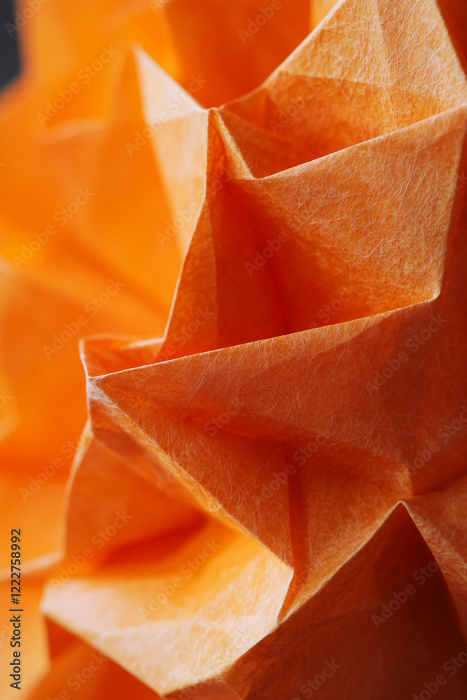 Poster close-up of crumpled orange tissue paper with intricate folds and creases, abstract pattern