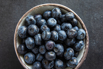 blueberry ripe juicy berries natural product snack fresh tasty food dish gourmet food background on the table rustic food top view copy space keto and paleo diet Vegetarian and vegan food