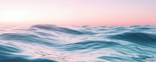 Fototapeta premium Tranquil pink and blue sunset over ocean waves