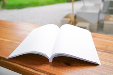 Blank catalog, magazines, book, mock up on wooden background. Mock up for design