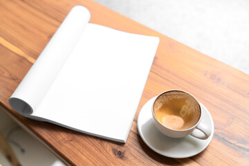 Empty coffee cup on wooden table background