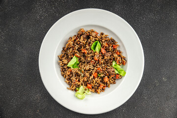 Rice lentil and vegetables snack fresh tasty food dish vegetarian vegan food no meat gourmet food background on the table rustic food top view copy space keto and paleo diet