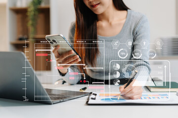 Business woman hand Project manager working and update tasks and Gantt chart scheduling virtual diagram..