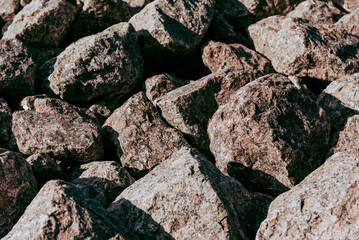 Natural stone texture with cracks, vegetation and dirt, texture background