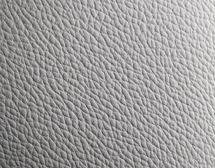 Grey Leather Texture: Close-up shot of a textured grey leather surface, showcasing the intricate details and subtle variations in tone. Perfect for background or design elements.