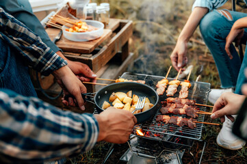 Close-up cooking in a camping setting.