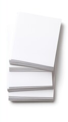 A stack of blank white paper sheets, useful for writing or printing.