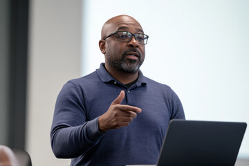 Engaging speaker presents a lecture on technology and education in a modern classroom setting