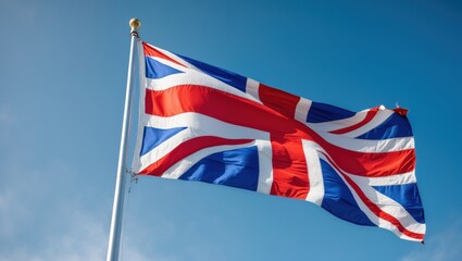 The image features the Union Jack flag fluttering against a clear blue sky, representing the United Kingdom and its heritage.