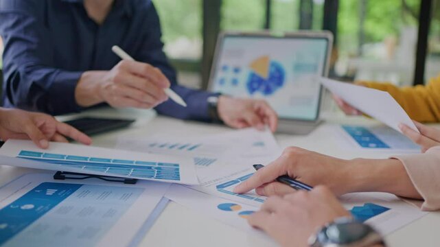 Investment Consultant,strategy,planning,Financial advisor and accounting concept.Group of business adviser meeting to analyze and discuss the situation on the financial report workplace office.